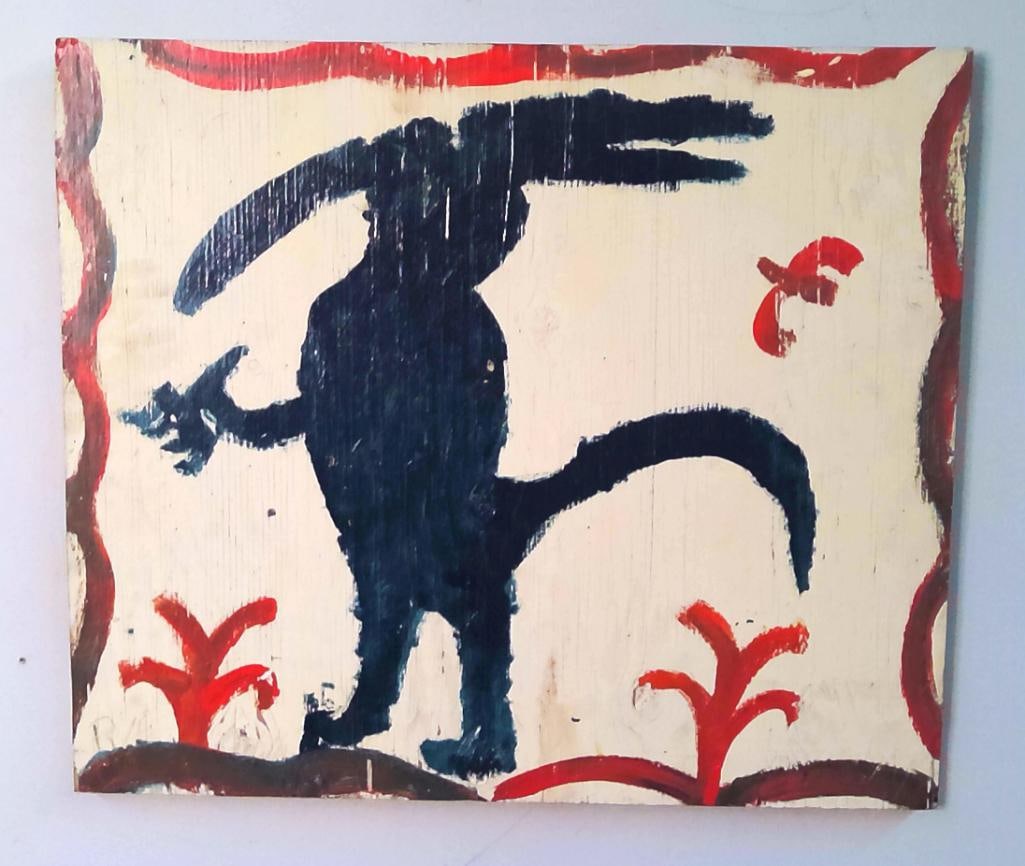 American School (Contemporary): Untitled (Black Animal), Folk-art composition in acrylic on corrugated board, depicting a large black, long-eared animal with a smaller creature in its forelegs, accompanied by a red rooster and