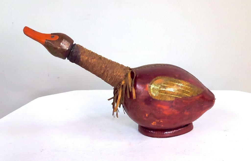 Folk Art Gourd-Covered Bottle or Decanter in Duck Form: Decorated gourd-covered bottles and flasks became popular among American folk artists and Southwestern craftsmen during the latter half of the twentieth century. The combination of natural gourd mater