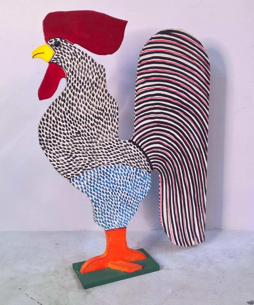 Marvin Finn (American/Kentucky, 1913–2007): Rooster, 1991, Large freestanding folk-art rooster sculpture constructed from cut and layered wood, painted on both sides with boldly patterned plumage. The body features black and blue feather-like d