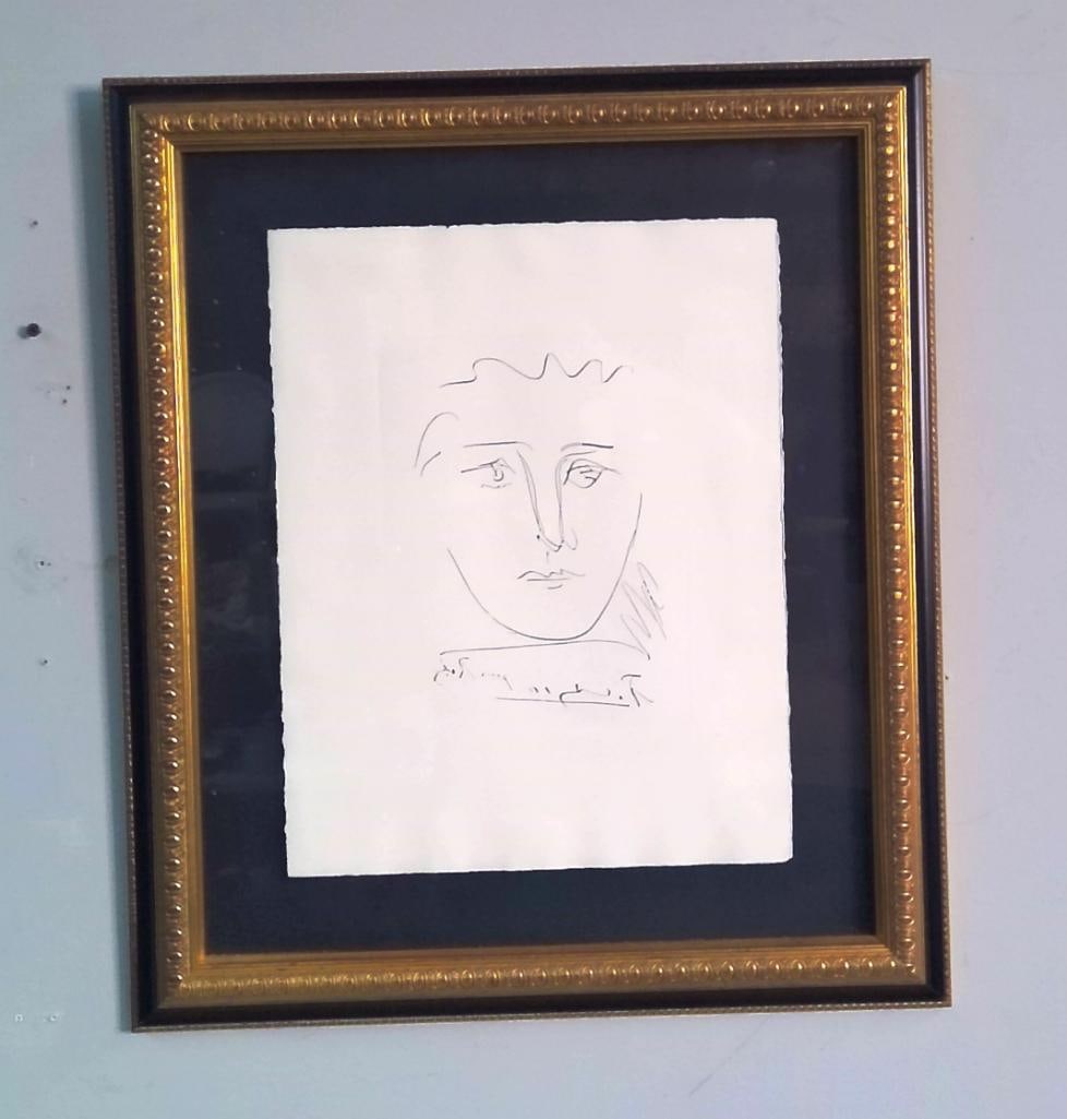 After Pablo Picasso (Spanish, 1881–1973): L’ge de soleil (Pour Roby), After 1950 Composition, The composition depicts a highly simplified frontal portrait rendered in spare linear contours. The sheet retains deckled edges. Apparently a late