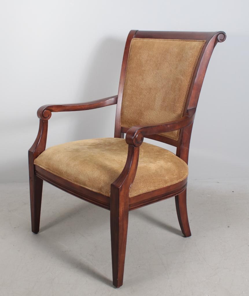 George III Style Mahogany Armchair: With a scrolling crestrail over an upholstered back, the upholstered seat flanked by shaped arms and stumps, the whole raised on tapering square legs Dimensions: H 39 x W 27 x D 30 inches NOTE: Wear c
