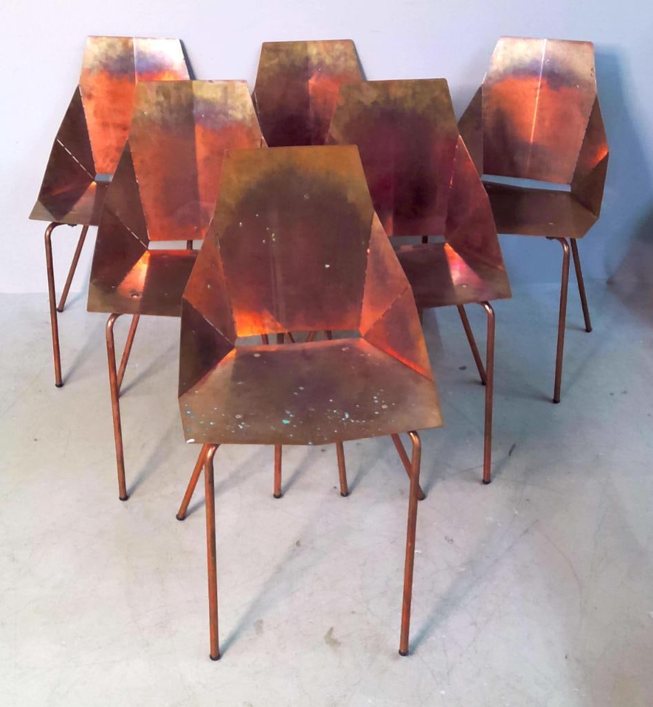 Set Of Six Sculptural Copper Dining Chairs: Set of six contemporary sculptural dining chairs of geometric form, constructed from folded and joined copper sheet over tubular copper-finished metal frames. Each features an angular faceted back, fl