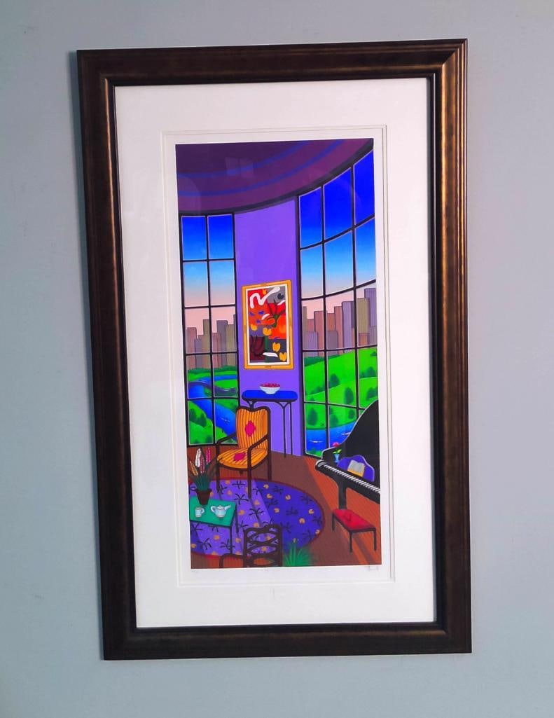 François “Fanch" Ledan (French, born 1949): Salon Rotonde, 2002, Vibrant architectural interiors, featuring a cozy rotunda room with a grand piano, vibrant artwork, and floor-to-ceiling windows overlooking a winding river and city skyline. 148/