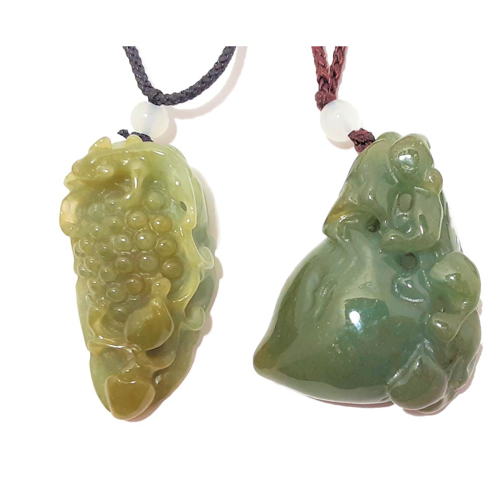 TWO FINE CARVED GREEN & YELLOW JADEITE PENDANTS: TWO FINE CARVED GREEN & YELLOW JADEITE PENDANTS KYLIN ON PEACH AND GRAPES. Necklace L: 22 inches, 56 cm; 16.4 g. Pendant L: 1.6 inches, 4 cm; W: 0.8 inches, 2 cm. Necklace L: 21 inches, 54 cm; 29.5 g.