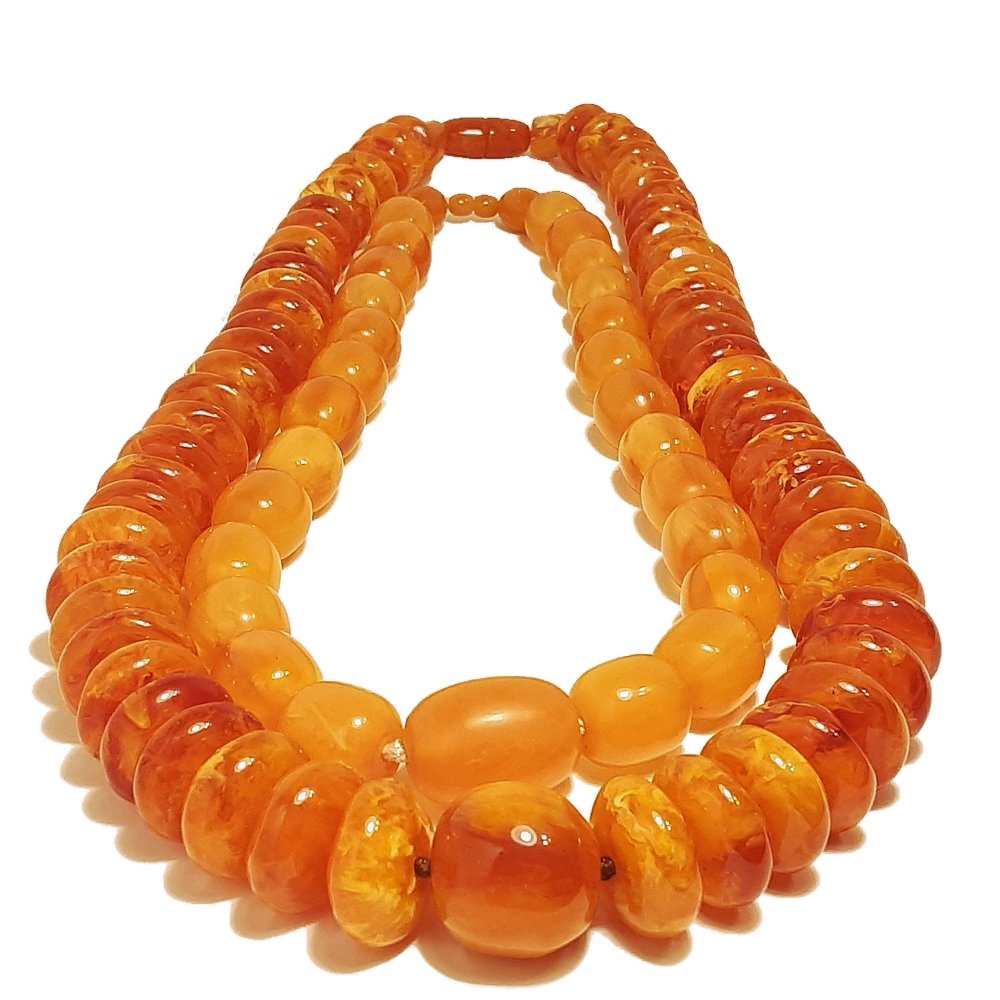 TWO LARGE STRANDS BUTTERSCOTCH AMBER RESIN BEADS (1 of 2)