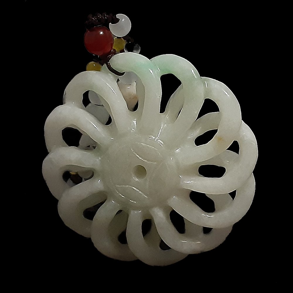 NATURAL UNTREATED JADEITE PENDANT INFINITY SYMBOL: THE EXQUISITELY CARVED PENDANT ALL DONE FROM ONE PIECE OF JADEITE. ENDLESS KNOT REPRESENTING LONGEVITY AND INFINITY. 50 MM WIDE, 38 GRAMS.