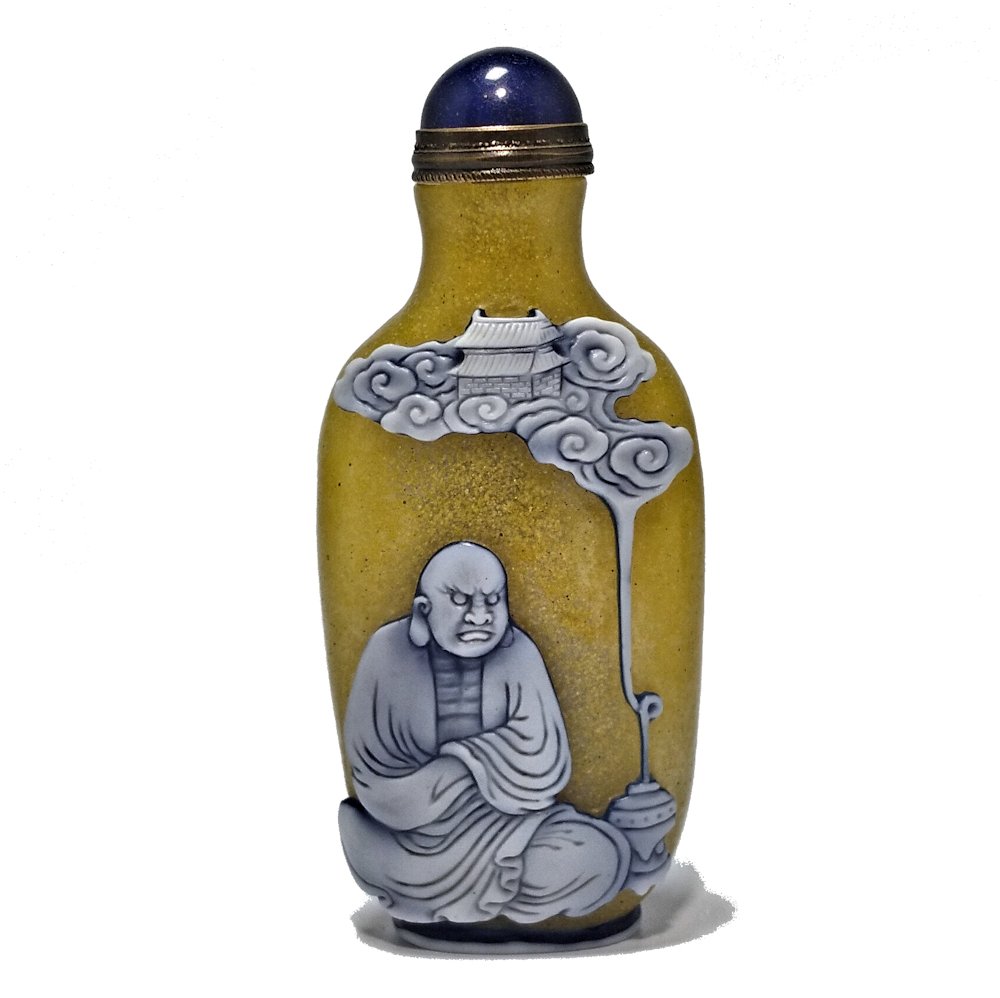 RARE EXQUISITE GLASS SNUFF BOTTLE LUOHANS: THE SUPERBLY CARVED AND RARE BOTTLE FEATURING TWO OF THE 18 BUDDHIST LUOHANS (ARHATS).THE BOTTLE IS CARVED IN THREE LAYERS ON BUBBLE INFUSED YELLOW BACKGROUND. IT IS 3.5 INCHES TALL. PROVENANCE: PRIVA