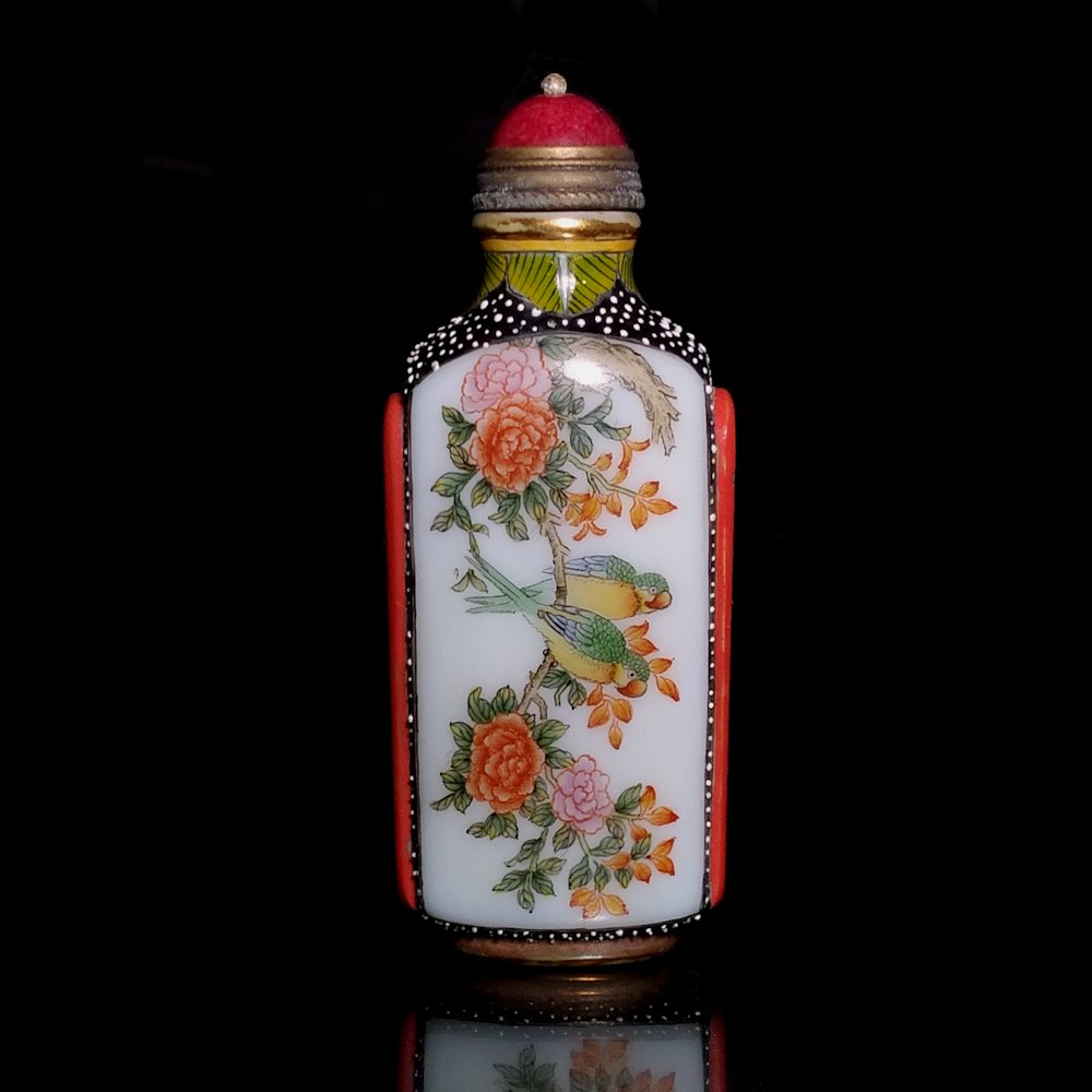RARE CHINESE ENAMEL GLASS SNUFF BOTTLE BIRDS FLORA: THE UNIQUE BOTTLE SO FINELY ENAMELED FEATURING A BIRDS BATS AND FLORA. THE SIDES ARE DECORATED IN STUNNING PATTERNS AND COLORS. THIS GREAT BOTTLE BEARS A QIANLONG MARK. IT IS 2.7 INCHES TALL. PROVENAN