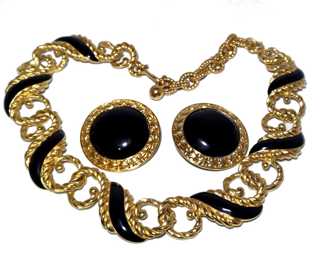 STUNNING TRIFARI NECKLACE AND EARRINGS BLACK, GOLD: THE LOVELY NECKLACE IN GOLD TONE WITH BLACK ENAMEL. IT IS MARKED TRIFARI TM AND SO ARE THE EARRINGS. THE NECKLACE IS 18 INCHES LONG, ADJUSTABLE TO SHORTER. WE WILL COMBINE SHIPPING AS BEST AS WE CAN.