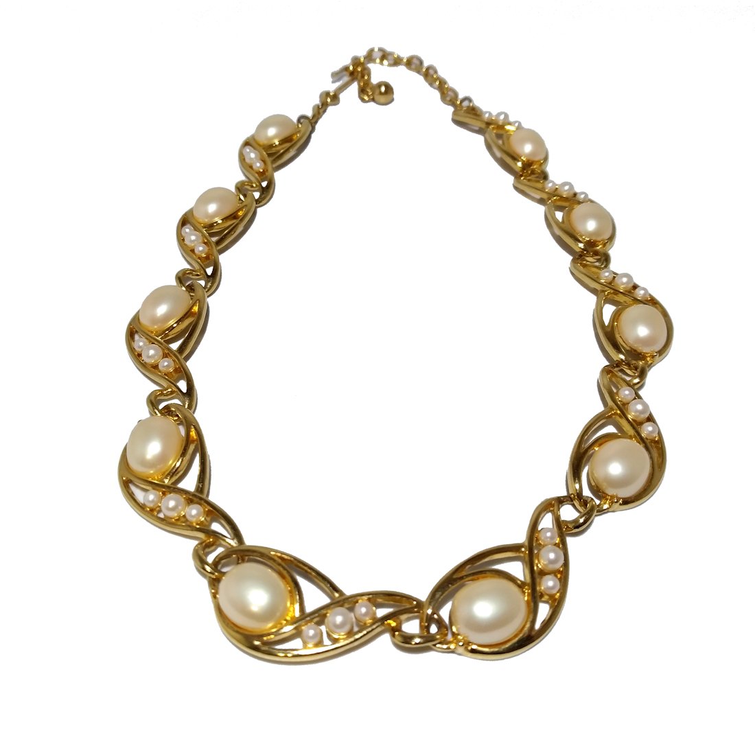 A GORGEOUS TRIFARI 90S STATEMENT NECKLACE: THE GOLD TONE AND FAUX PEARL NECKLACE IS 16 TO 18" LON IT IS IN VERY GOOD CONDITION. INCHES LONG.. HAVE A LOOK AT OUR AUCTIONS. WE COMBINE SHIPPING AND PROVIDE IN-HOUSE SHIPPING FOR YOUR ADDED CONVENI