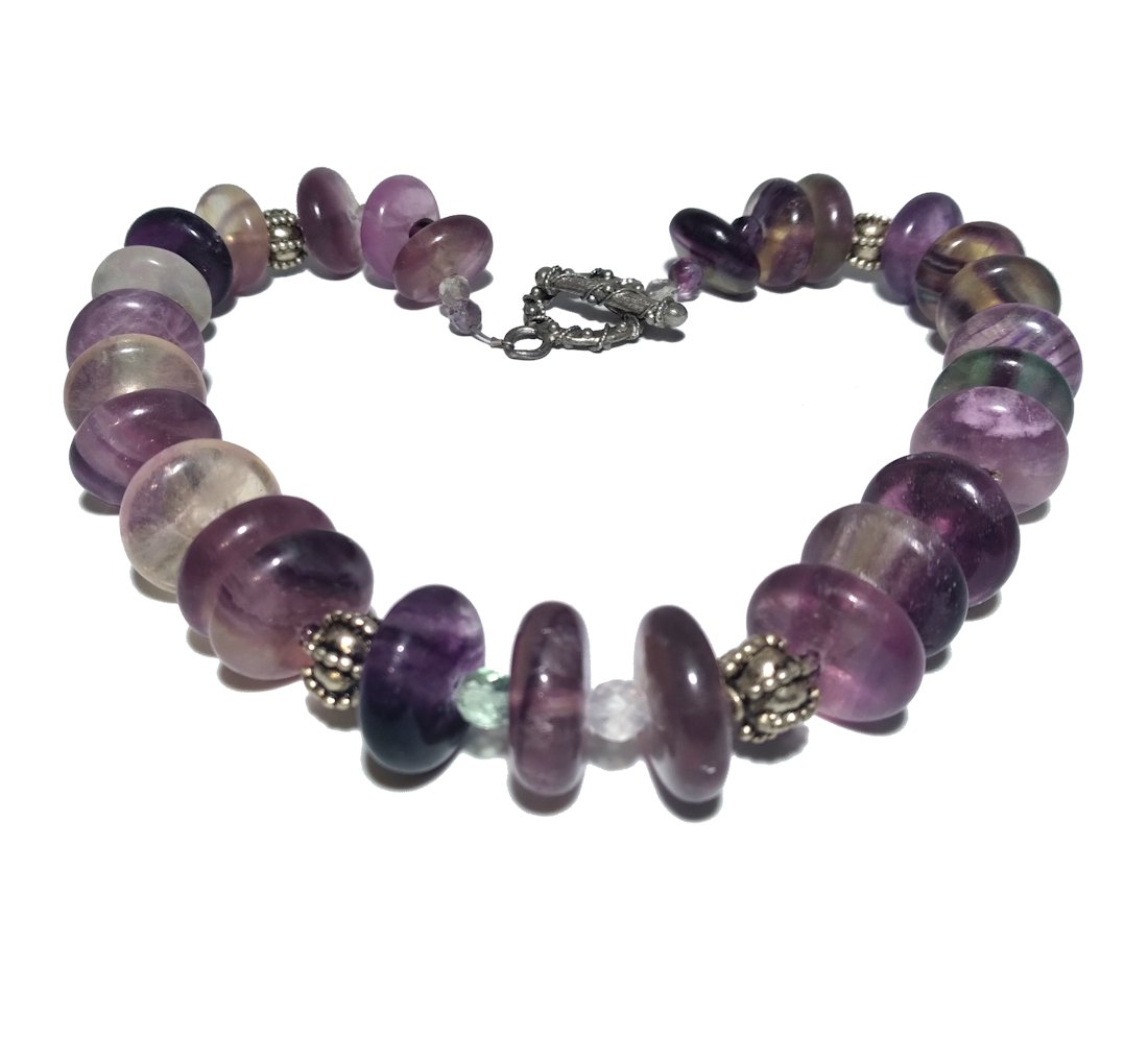 AN IMPRESSIVE AMETHYST QUARTZ NECKLACE: THE IMPRESSIVE NECKLACE FEATURES AMETHYST QUARTZ AND FLUORITE BEADS. IT IS 16.5 INCHES LONG. WE COMBINE SHIPPING.