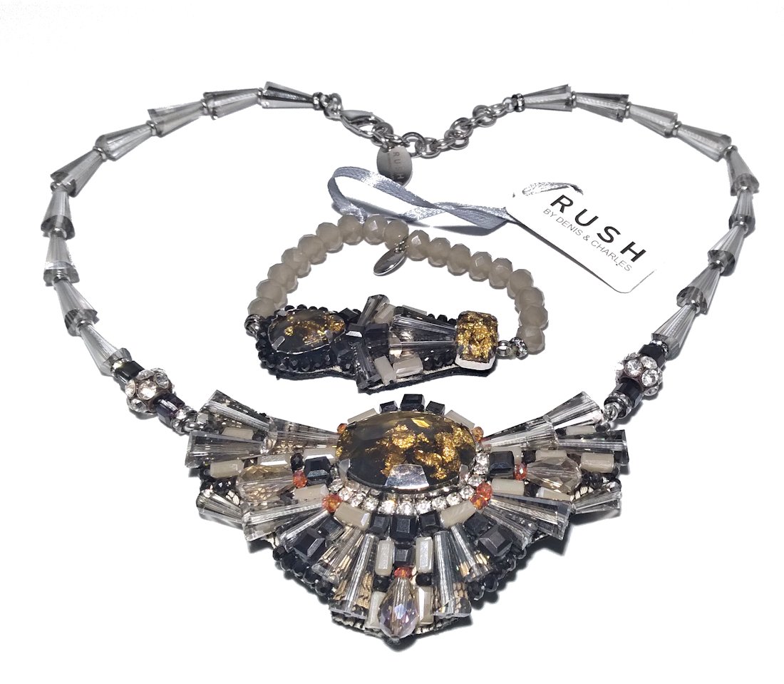 STUNNING NECKLACE BRACELET BY RUSH BY DENNIS AND CHARLES: THE LOT FEATURES 2 PIECES. THE NECKLACE EXTENDS UP TO 17 INCHES. THE BRACELET IS AN ADJUSTABLE STYLE. VERY IMPRESSIVE. IN VERY GOOD CONDITION. WE COMBINE SHIPPING.