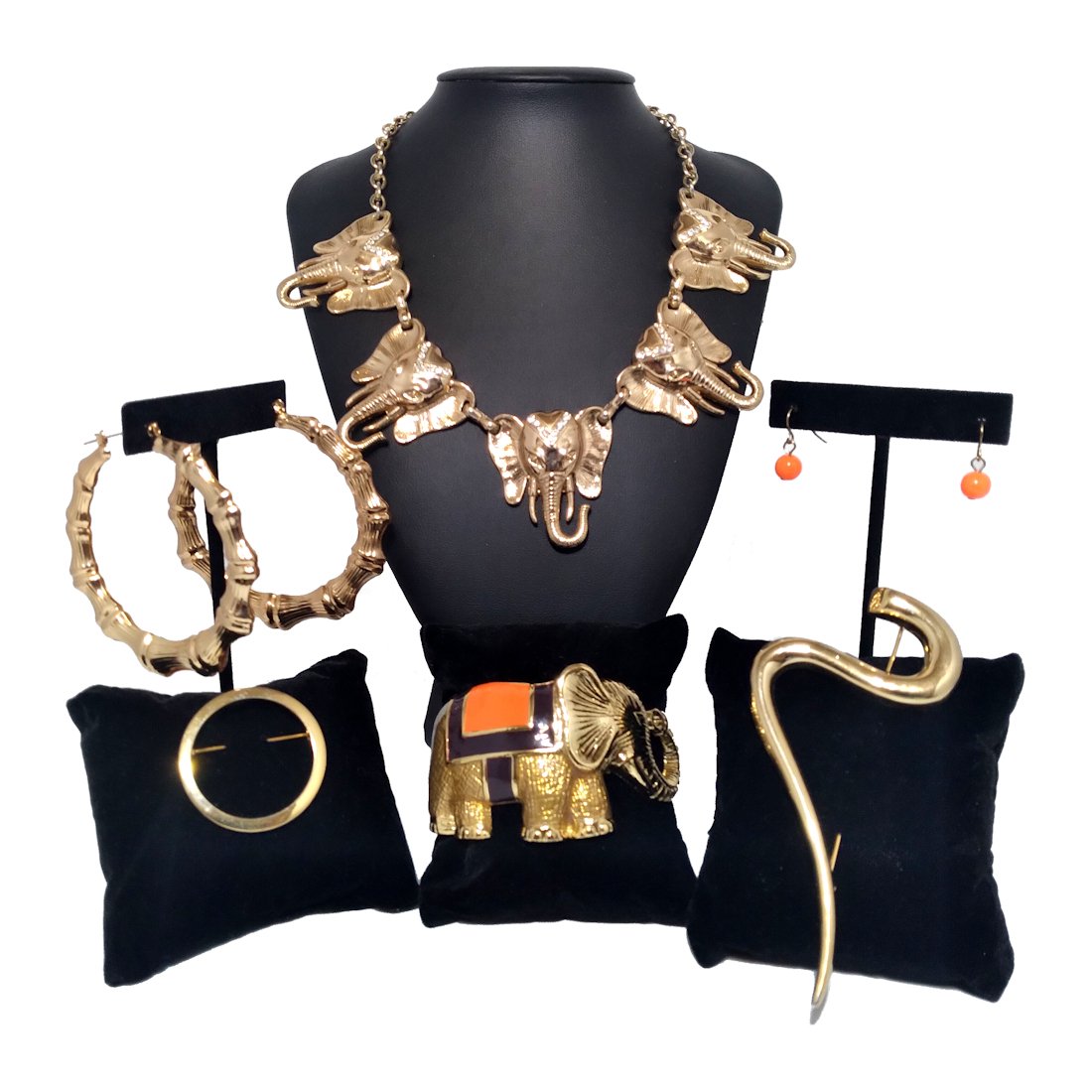 COSTUME JEWELRY LOT ELEPHANT BRACELET NECKLACE + MORE: THIS BEAUTIFUL LOT INCLUDES A STUNNING ENAMELED ELEPHANT BRACELET. IT IS HINGED AND FEATURES TWO ELEPHANTS FACING EACH OTHER.THE NECKLACE FEATURES ELEPHANTS IN GOLD TONE WITH RHINESTONE DECORATIONS. T
