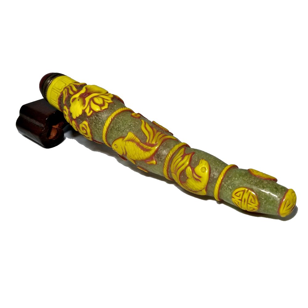 RARE VIAL SHAPED PEKING GLASS SNUFF BOTTLE CARP: THE RARE BOTTLE CARVED IN THREE LAYERS OF GLASS. THE BASE LAYER IS A BUBBLE INFUSED PALE YELLOW. THE MIDDLE LAYER IS RED AND THE TOP LAYER IS YELLOW. THE BOTTLE DEPICTS CARP, LOTUS AND THE SHOU SYMBOL