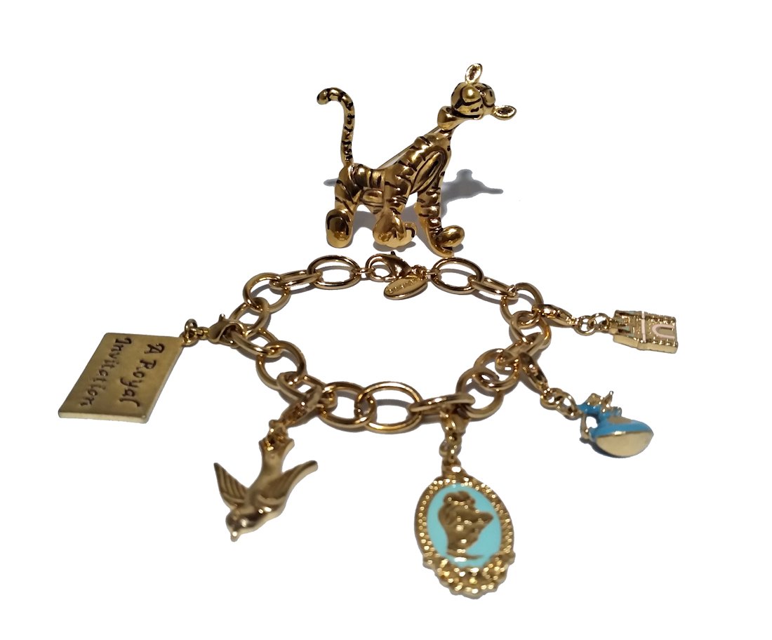 BEAUTIFUL COSTUME JEWELRY LOT FROM DISNEY BRACELET + BROOCH: This lot containing a 7" length bracelet and 2.25" by 2" brooch both signed Disney. We combine shipping.
