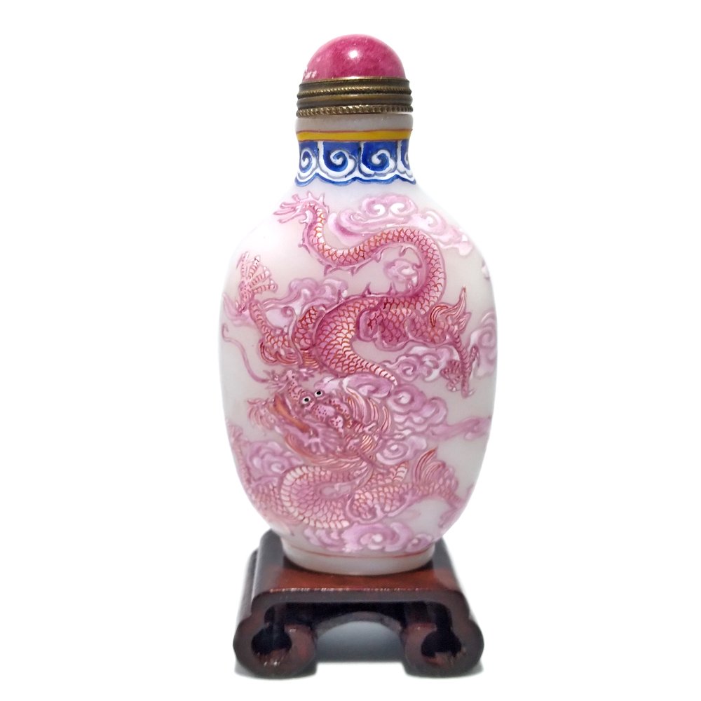 CHINESE SNUFF BOTTLE ENAMEL ON GLASS IMPERIAL DRAGON: THE STUNNING BOTTLE DEPICTS AN IMPERIAL 5 CLAWED DRAGON ON BOTH SIDES. IT BEARS A QIANLONG MARK. THE BOTTLE IS 3.25 INCHES TALL. PROVENANCE: PRIVATE FLORIDA COLLECTION.