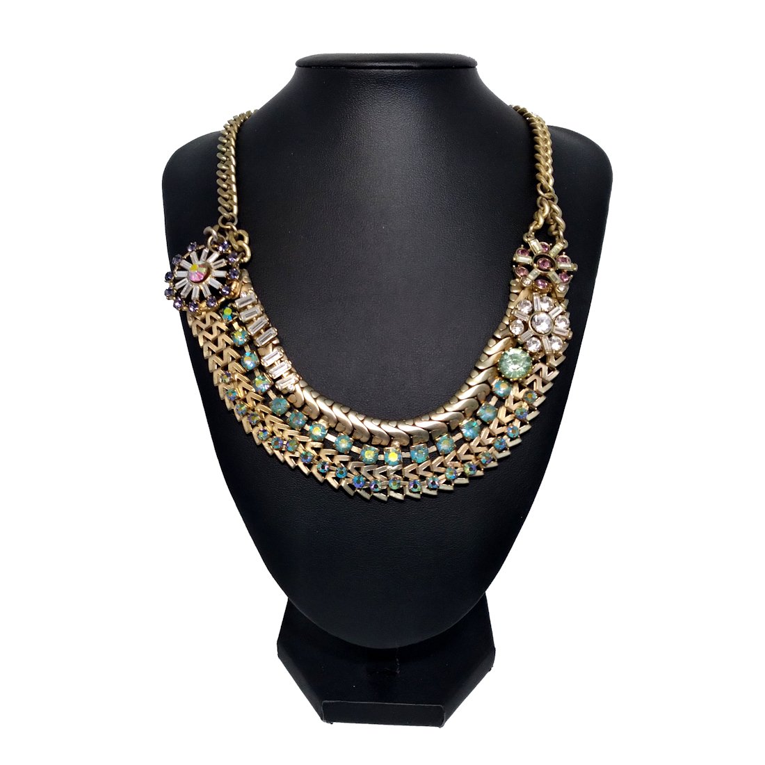A STUNNING VINTAGE RHINESTONE NECKLACE PRONG SET: THE LOVELY NECKLACE IN GOLD TONE HAS TWO ROWS OF PRONG SET RAINBOW COLORED RHINESTONES AS WELL AS AN ASYMMETRYCAL FLOWER DESIGN. THE NECKLACE MEASURES 16 TO 18 INCHES, EXTENSION INCLUDED. IN EXCELLENT