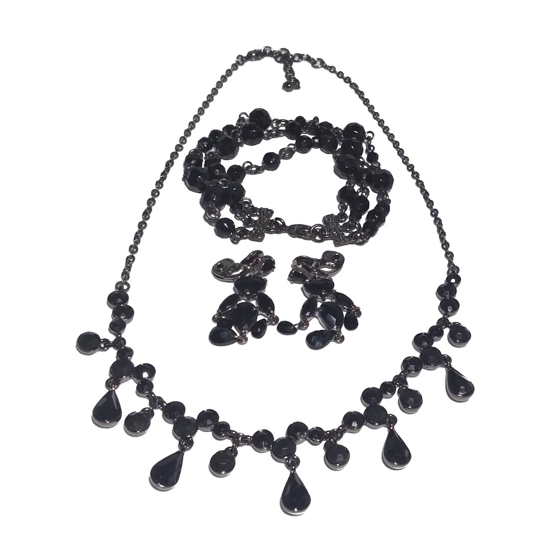 GOTHIC VICTORIAN REVIVAL BLACK NECKLACE BRACELET EARRINGS: THE LOT FEATURES 3 PIECES. THE NECKLACE EXTENDS UP TO 17 INCHES. THE BRACELET IS 7" LONG. THE EARRINGS ARE FOR PIERCED EARS. ALL FEATURE BLACK RHINESTONES. IN VERY GOOD PREOWNED CONDITION. WE COMBINE 
