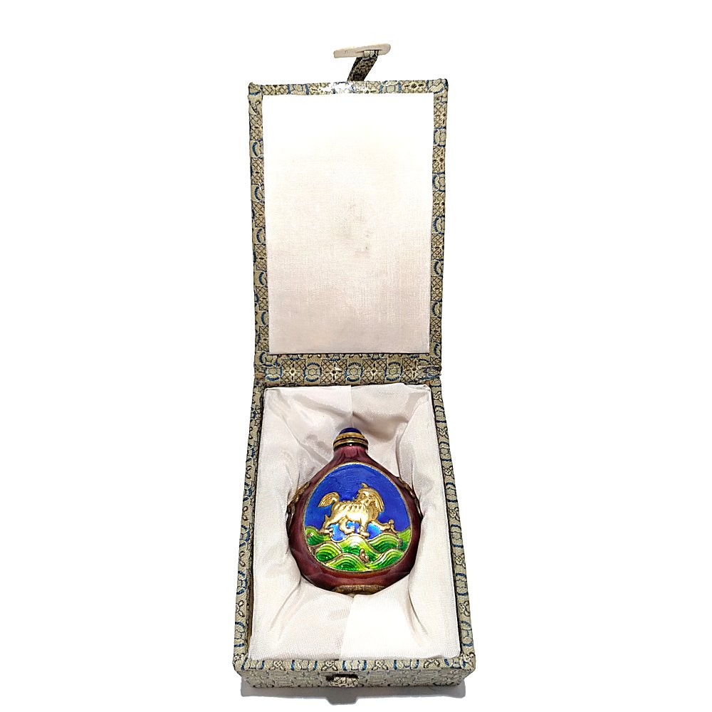 SUPERB CHINESE ENAMEL ON COPPER SNUFF BOTTLE FOO LION: The bottle enameled in jewel colors and gilded. it depicts a foo lion on both sides with lion shoulders. The bottle it is 2.75 inches tall. It is in excellent condition.