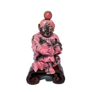 FINE ANTIQUE CHINESE CARVED FIGURAL SNUFF BOTTLE RHODONITE 19TH C: A RARE, VERY WELL CARVED SNUFF BOTTLE IN THE SHAPE OF A SEATED BOY. IT IS CARVED OUT OF RHODONITE AND IT HAS NATURAL STRIATIONS AND LINE IN THE STONE. THE CARVING IS EXCELLENT. THE BOTTLE IS 2.3