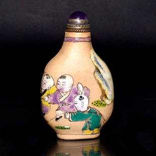 FINE CHINESE YIXING CLAY SNUFF BOTTLE BOYS AT PLAY: THE FINE YIXING ZISHA CLAY SNUFF BOTTLE IS WELL ENAMELED WITH A SCENE OF CHILDREN AT PLAY. THE STOPPER BEARS AN AMETHYST. IT IS 2.6 INCHES TALL. STANDS ARE FOR DISPLAY ONLY, NOT INCLUDED UNLESS