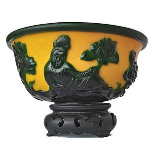 SUPERB CARVED YELLOW PEKING GLASS BOWL GUANYIN LOTUS: THE BOWL CARVED IN DEEP GREEN OVER YELLOW GLASS. IT FEATURES GUANYIN AND THE BUDDHA. IT IS ALSO DECORATED WITH LOTUS ALL AROUND AND WITH A FLYING CRANE. THE YELLOW BACKGROUND IS DETAILED WITH ANETCHED