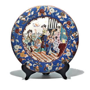 SUPERB CHINESE ENAMELED FAMILLE ROSE PLATE LADIES QIANLONG MARK: THE BEAUTIFULLY ENAMELED PLATE DEPICTS COURT LADIES PLAYING MUSIC AND DANCING. QIANLONG MARK. THE PLATE IS 10 INCHES WIDE. STANDS ARE FOR DISPLAY ONLY, NOT INCLUDED UNLESS OTHERWISE STATED. PROPERTY O