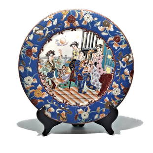 SUPERB CHINESE ENAMELED FAMILLE ROSE PLATE LADIES QIANLONG MARK: THE BEAUTIFULLY ENAMELED PLATE DEPICTS COURT LADIES PLAYING MUSIC AND DANCING. QIANLONG MARK. THE PLATE IS 10 INCHES WIDE. STANDS ARE FOR DISPLAY ONLY, NOT INCLUDED UNLESS OTHERWISE STATED. PROPERTY