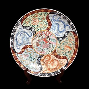 VERY LARGE MAGNIFICENT JAPANESE MEIJI CHARGER 18 INCHES DRAGONS: THE BREATHTAKING CHARGER FEATURED SUPERBLY ENAMELED SECTIONS OF DRAGONS, GEISHAS AND OTHER MOTIFS, ALL HAND PAINTED WITH FINE DETAIL. THE SHALLOW BOWL/CHARGER IS 18 INCHES WIDE. MEIJI OR TAISHO PERIOD