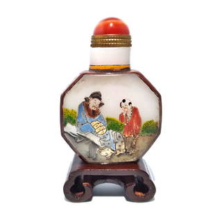 FABULOUS CHINESE ENAMEL ON GLASS SNUFF BOTTLE SCHOLAR PUPILS QIANLONG MARK: THE DIAMOND SHAPED ENAMELED SNUFF BOTTLE DEPICTS SCENES OF SCHOLARS AND YOUNG PUPILS, WITH A SURROUNDING LANDSCAPE. THE SHOULDERS ARE DECORATED WITH A FLORAL PATTERN. THE BOTTLE BEARS A QIANLONG MARK.
