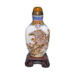 SUPERB CHINESE ENAMEL ON GLASS SNUFF BOTTLE EAGLE QIANLONG MARK: THE SUPERBLY ENAMELED BOTTLE DEPICTS TWO SCENES FEATURING GLORIOUS EAGLES. THE BOTTLE BEARS A QIANLONG DATE MARK. IT IS 3 INCHES TALL. STANDS ARE FOR DISPLAY ONLY, NOT INCLUDED UNLESS OTHERWISE STATED