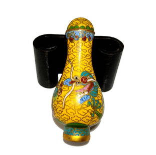 STUNNING SNUFF BOTTLE CLOISONNE IMPERIAL DRAGON: THIS STUNNING ANTIQUE CLOISONNE BOTTLE ISDEPICTS AN IMPERIAL DRAGON ON YELLOW GROUND. IT IS 2.4 INCHES TALL. PROVENANCE: FLORIDA PRIVATE COLLECTOR.WE PROVIDE IN-HOUSE SHIPPING FOR YOUR CONVENIENCE. ST