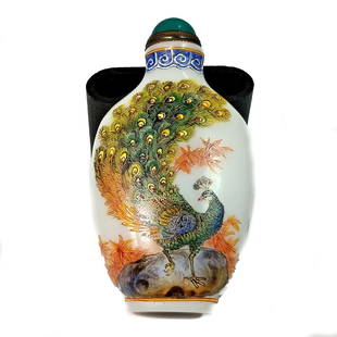 VERY FINE ENAMELED GLASS CHINESE SNUFF BOTTLE PEACOCK: THE BEAUTIFULLY ENAMELED BOTTLE DEPICTS A A PEACOCK WITH MUCH DETAIL. IT IS 3.2 INCHES TALL.IT BEARS A QIANLONG SEAL. PROVENANCE: FLORIDA PRIVATE COLLECTOR.WE PROVIDE IN-HOUSE SHIPPING FOR YOUR CONVEN