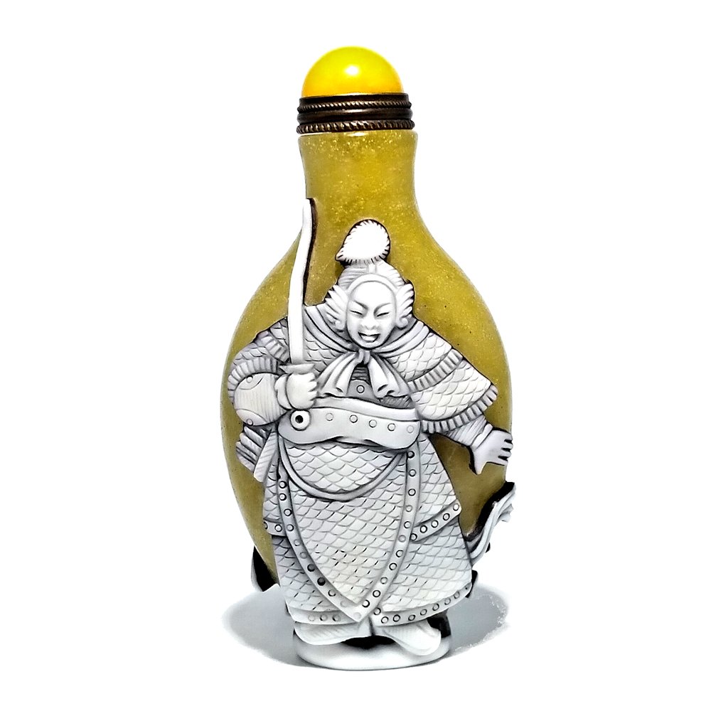 FINE CHINESE PEKING GLASS SNUFF BOTTLE GENERAL: THE FINELY CARVED CHINESE SNUFF BOTTLE DEPICTS A GENERAL WITH HIS SWORD AND ARMOR IN GREAT DETAIL. THE BOTTLE IS 3.25 INCHES TALL. STANDS ARE FOR DISPLAY ONLY, NOT INCLUDED UNLESS OTHERWISE STATED.PRO