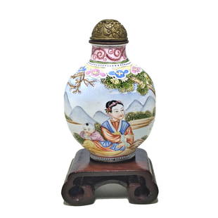 VERY FINE CHINESE ENAMEL ON COPPER SNUFF BOTTLE MOTHER CHILD QIANLONG MARK: THE REFINED MINIATURE SNUFF BOTTLE FEATURES MOTHER AND CHILD WITH A SCENIC BACKGROUND AND A SHEPHERD WITH GOATS OVERLOOKING A LAKE. THERE IS A SUBTLE EUROPEAN TOUCH TO THE DESIGN AS THERE IS A CHURCH