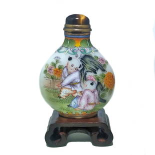 RARE CHINESE ENAMEL SNUFF BOTTLE BOYS QIANLONG MARK: THE SUPERB CHINESE SNUFF BOTTLE IS SO FINELY PAINTED ON MILK GLASS. IT DEPICTS BOYS AT PLAY. THE BOTTLE BEARS A QIANLONG MARK. THE STOPPER IS ADORNED WITH A TIGER'S EYE CABOCHON. THE MOUTH AND FOOT AR