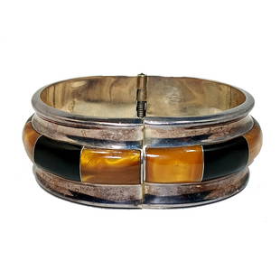 A STUNNING VINTAGE MEXICO 950 BRACELET INLAID AMBER: WHAT A FABULOUS PIECE! THE BRACELET IS INLAID WITH NATURAL AMBER AND BLACK ENAMEL. IT IS MARKED MEXICO 950 AND WHAT SEEMS TO BE TS-75? IT WEIGHS 63 GRAMS. IT OPENS BY A SPRING MECHANISM. THE SHAPE