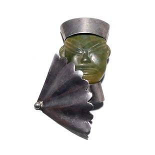 A STUNNING VINTAGE MEXICO STERLING ENRIQUE LEDESMA FIGURAL BROOCH: WHAT A STUNNING AND RARE PIECE! SIGNED LEDESMA STERLING, IT DEPICTS A CHINESE MAN, CARVED IN JADE AND SET IN STERLING SILVER. THIS IS A LARGE BROOCH MEASURING 3.25" TALL. IT WEIGHS 40 GRAMS. WE PROVID