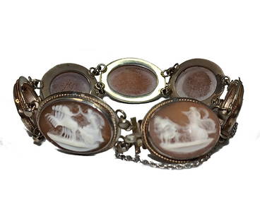 A WELL CARVED SHELL CAMEO BRACELET 7  GREEK GODS 7.5": THE FINE BRACELET FEATURES 7 PANELS DEPICTING GREEK GODS EACH PANEL IS 0.8" LONG. THE BRACELET 7.5" LONG.IT IS SET IN A SILVER SETTING, MARKED 800. WE PROVIDE IN-HOUSE SHIPPING.