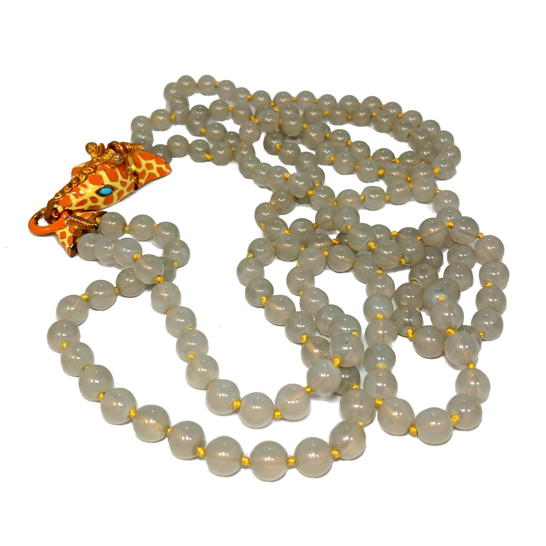 A RARE VINTAGE J.CREW CHALCEDONY AND ENAMEL GIRAFFE NECKLACE: THE FABULOUS VINTAGE J. CREW NECKLACE IS 32 INCHES LONG, WITH CHALCEDONY BEADS ABOUT 10MM IN SIZE. THE FIGURAL CLASP IS STUNNING!WE PROVIDE IN-HOUSE SHIPPING FOR A SMOOUTH CHECKOUT PROCESS.