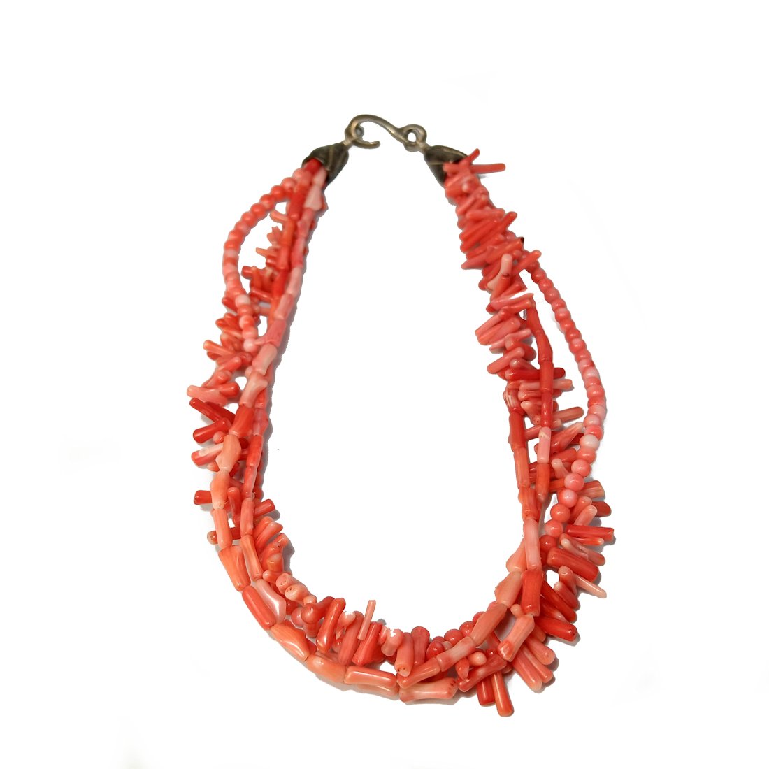 A SOUTHWESTERN NECKLACE OF CORAL AND STERLING SILVER: THE CORAL NECKLACE IS 17.5" LONG. THE 4 STRANDS CONNECT WITH STERLING SILVER CONES AND HOOK CLASP. THE NECKLACE WEIGHS 74 GRAMS. WE PROVIDE IN-HOUSE SHIPPING FOR A SMOOTH AND SEAMLESS CHECKOUT.