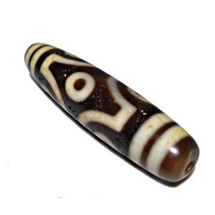 A FINE SINO-TIBETAN AGATE DZI BEAD 6 EYES 58MM: THE EXCELLENT AGATE DZI BEAD FEATURES 6 EYES. IT IS 57MM LONG AND FEATURES PATINA FROM AGE. PROVENANCE: PRIVATE FLORIDA COLLECTOR. WE PROVIDE IN-HOUSE SHIPPING FOR A SMOOTH TRANSACTION.