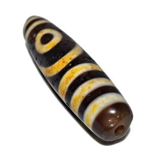 A RARE SINO-TIBETAN AGATE DZI BEAD 2 EYES 58MM: THE EXCELLENT AGATE DZI BEAD FEATURES 2 EYES. IT IS 58MM LONG AND FEATURES PATINA FROM AGE. PROVENANCE: PRIVATE FLORIDA COLLECTOR. WE PROVIDE IN-HOUSE SHIPPING FOR A SMOOTH TRANSACTION.