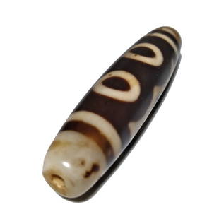 A FINE SINO-TIBETAN AGATE DZI BEAD 3 EYES 58MM: THE EXCELLENT AGATE DZI BEAD FEATURES 3 EYES. IT IS 58MM LONG AND FEATURES PATINA FROM AGE. PROVENANCE: PRIVATE FLORIDA COLLECTOR. WE PROVIDE IN-HOUSE SHIPPING FOR A SMOOTH TRANSACTION.