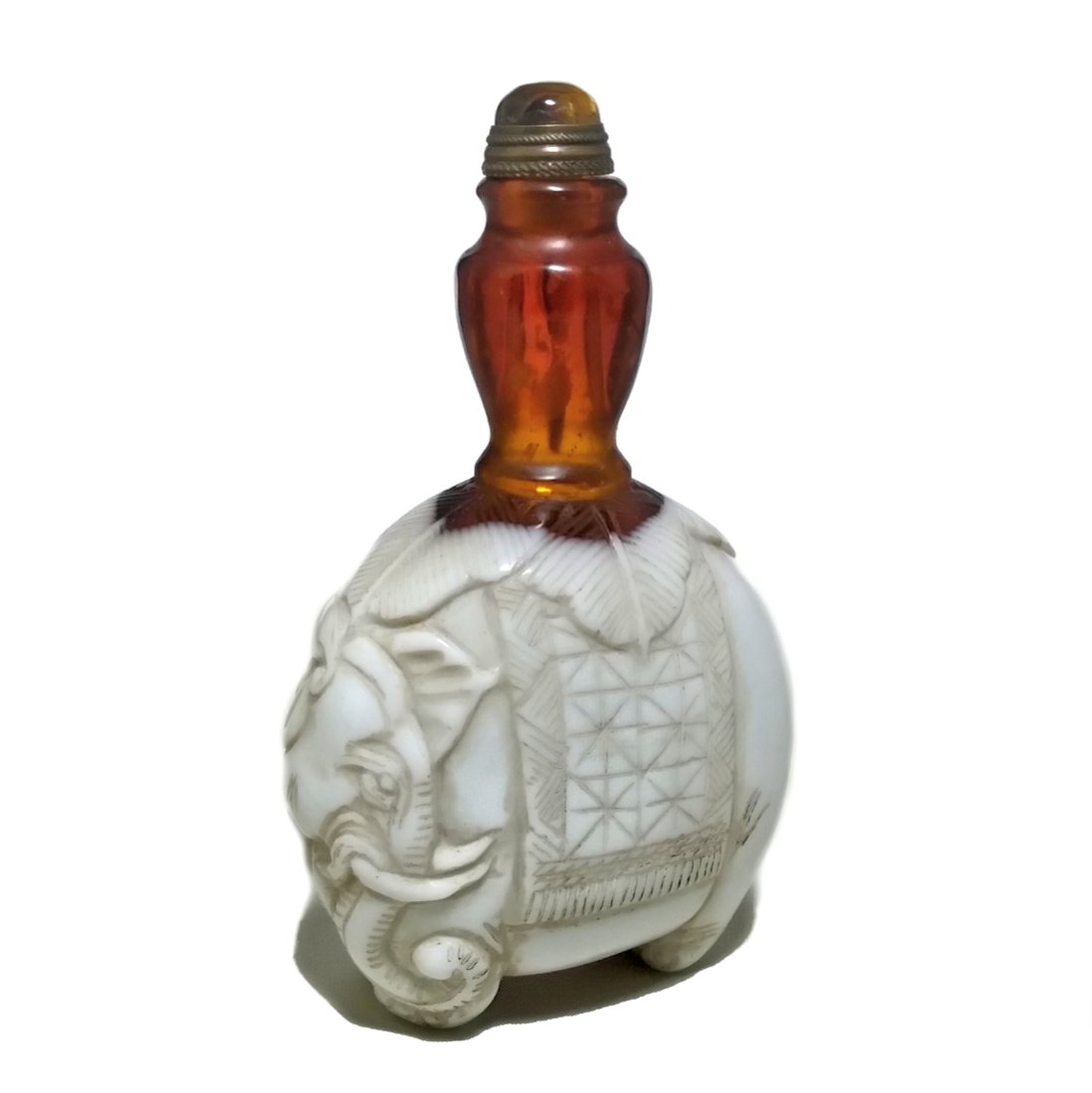 CHINESE PEKING GLASS SNUFF BOTTLE IMPERIAL ELEPHANTS: THE FIGURAL BOTTLE IS VERY WELL CARVED FEATURING AN IMPERIAL ELEPHANT WITH FINE DETAIL. ELEPHANTSWERE OFTEN GIFTED TO THE QIANLONG EMPEROR BY EAST ASIAN KINGS. THE ELEPHANTS WEREDRESSEDINOPULENT SADDL