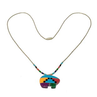 A NATIVE AMERICAN SOUTHWESTERN NECKLACE STERLING INLAY: THE STUNNING NECKLACE MEASURES 23" AROUND. THE PENDANT IS IN THE SHAPE OF A BEAR, INLAID WITH STONES- TURQUOISE, CORAL, ONYX, SPINEY OISTER, CHAROITE AND MALACHITE. WE PROVIDE IN-HOUSE SHIPPING FOR YO