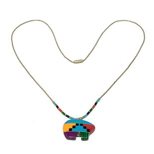 A NATIVE AMERICAN SOUTHWESTERN NECKLACE STERLING INLAY: THE STUNNING NECKLACE MEASURES 23" AROUND. THE PENDANT IS IN THE SHAPE OF A BEAR, INLAID WITH STONES- TURQUOISE, CORAL, ONYX, SPINEY OISTER, CHAROITE AND MALACHITE. WE PROVIDE IN-HOUSE SHIPPING FOR