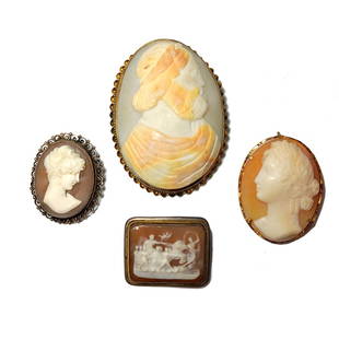 4 EXCELLENT ANTIQUE SHELL CAMEOS: OFFERED HERE IS AN EXCELLENT GROUP OF 4 SHELL CAMEOS. THE LARGEST IS THE SOCRATES CAMEO, 2.25" LONG.IT IS SET IN GOLD TONE METAL. THE OTHER THREE ARE SET IN SILVER. THE OBLONG CAMEO IS ALSO A