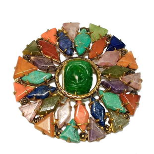 A STUNNING CHINESE EXPORT BROOCH GILT SILVER BROOCH: OFFERED HERE IS A STUNNING CHINESE EXPORT GILT SILVER BROOCH,INLAID WITH A MULTITUDE OF STONES AND JADEITE. IT IS MARKED CHINA. IT IS 2" IN DIAMETER. WE PROVIDE IN-HOUSE SHIPPING.