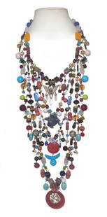A MAGNIFICENT STATEMENT NECKLACE BY DESIGNER STEFAN DINU: THE FANTASTIC NECKLACE IS A TRUE STATEMENT PIECE. IT IS A MULTI STRAND BIB WHERE THE SHORTEST STRAND IS 18" AND THE LONGEST STRAND IS 36" LONG. THIS IS A UNIQUE, ONE OF A KIND PIECE, HAND CREATED IN T